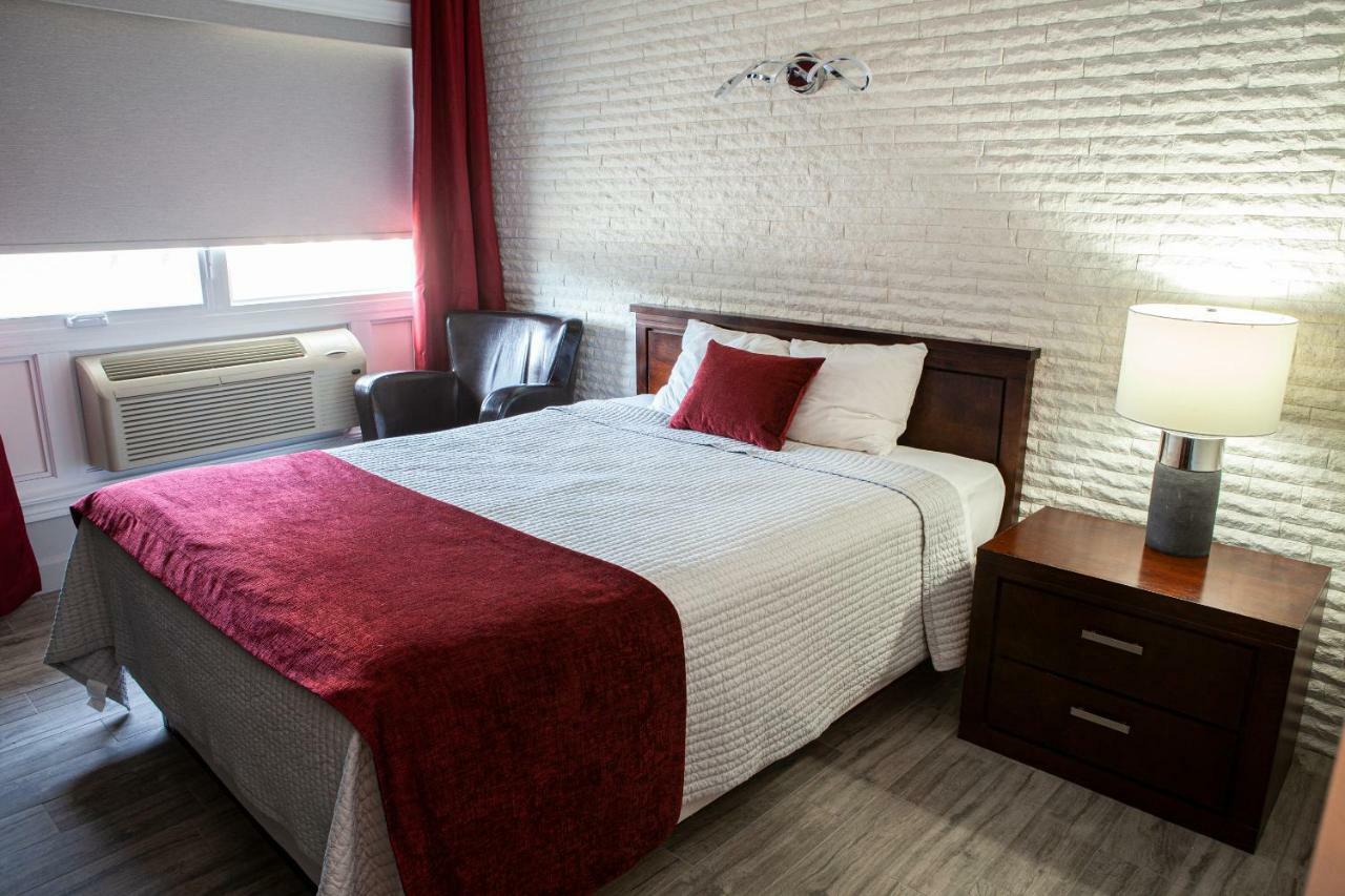 Hotel Motel Le Quiet Лак-Мегантик Экстерьер фото